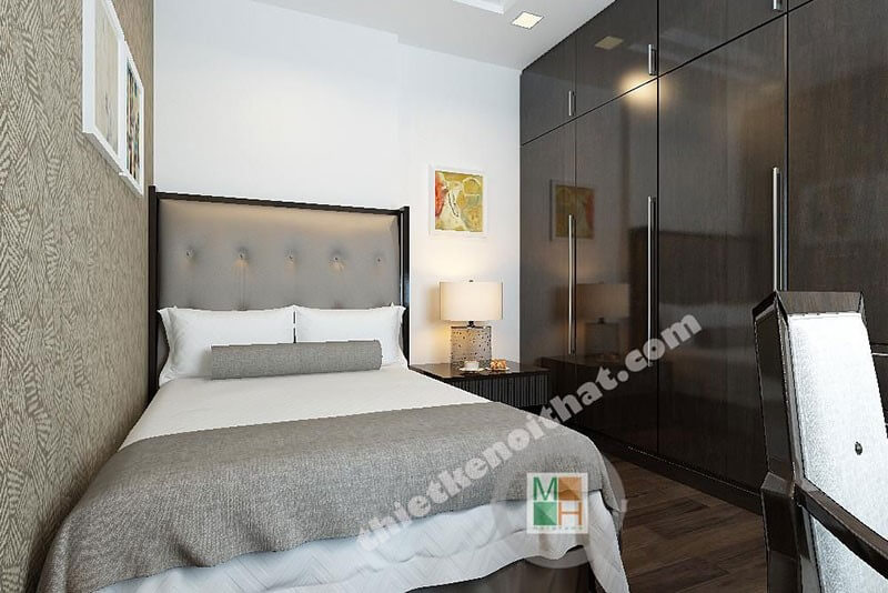 Mẫu tủ quần áo gỗ công nghiệp màu nâu với thiết kế âm tường giúp không gian phòng ngủ được mở rộng hơn